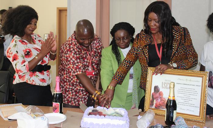 Mrs Diana Hopeson (middle) joined by Mr Ransford Tetteh (2nd left) and Ms Adwoa Serwaa Bonsu (right) to cut the cake to celebrate her long relation with Graphic. Looking on is Ms Mary Ghansah Mrs Diana Hopeson (middle) joined by Mr Ransford Tetteh (2nd left) and Ms Adwoa Serwaa Bonsu (right) to cut the cake to celebrate her long relation with Graphic. Looking on is Ms Mary Ghansah